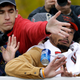 Illustration for article titled Hail Of Beer Cans At Red Sox Parade Injured One Fan, Got Another Arrested, And Damaged The World Series Trophy